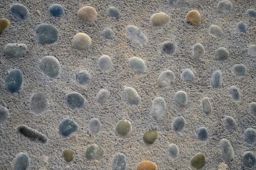 sea ​​pebbles with concrete as background 3
