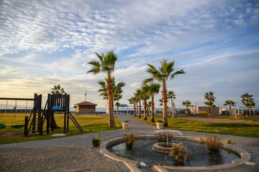 fountain in front of the road to the beach