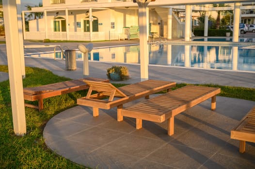 wooden sun loungers on the Mediterranean sea 1