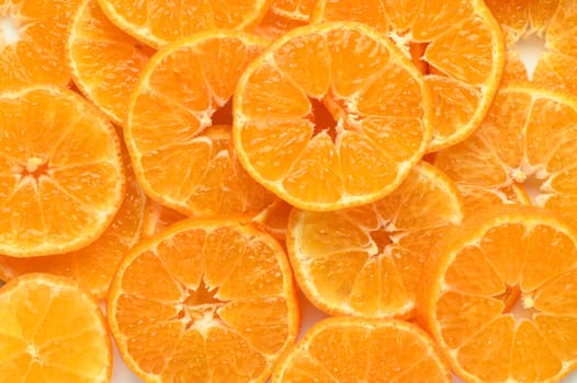 fresh juicy sliced ​​tangerines, background of sliced ​​tangerines