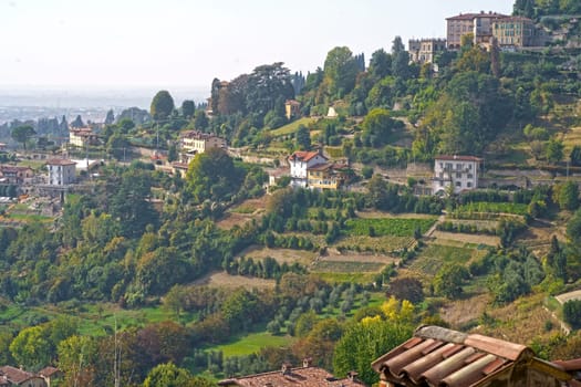 Italy. Bergamo. City on the hills. View at Old Town Citta Alta of Bergamo from San Vigilio Hill.