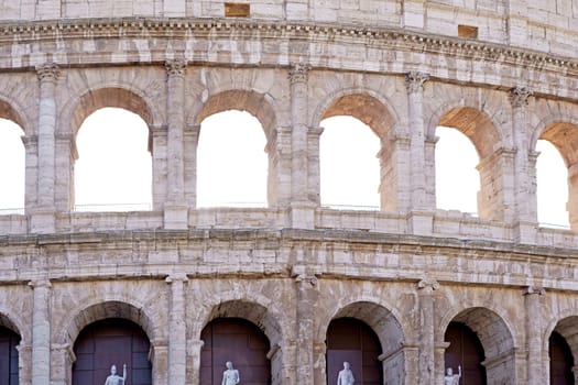 Background made of Colosseum with blue sky and clouds. Rome. Italy. Horizontally.