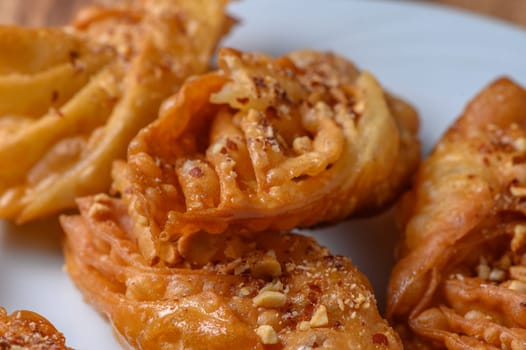 Turkish baklava, sweet dessert with honey on a light plate 8