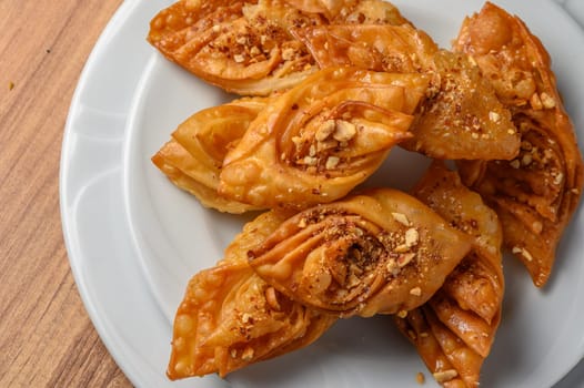 Turkish baklava, sweet dessert with honey on a light plate 21