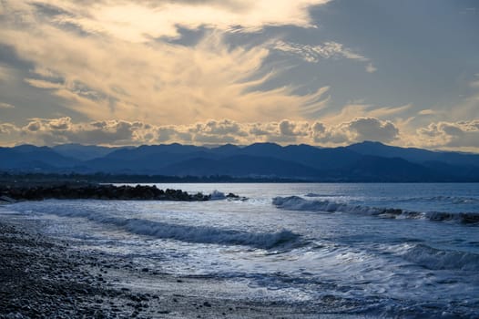 the sun sets behind a mountain on the Mediterranean coast 3