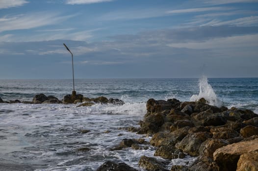 waves crashing on rocks on the Mediterranean coast 6