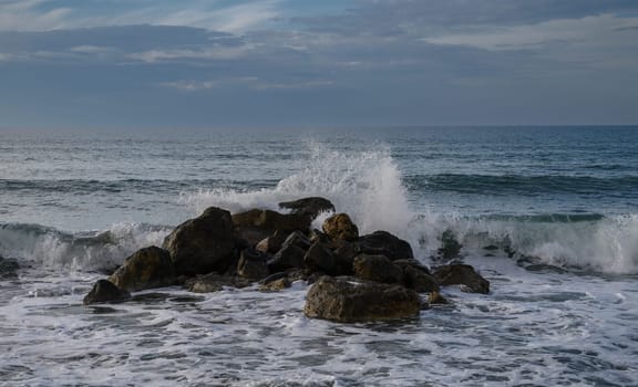 waves crashing on rocks on the Mediterranean coast 10