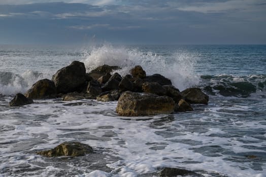 waves crashing on rocks on the Mediterranean coast 12