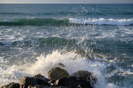 waves stones in the sea on the Mediterranean in winter 13