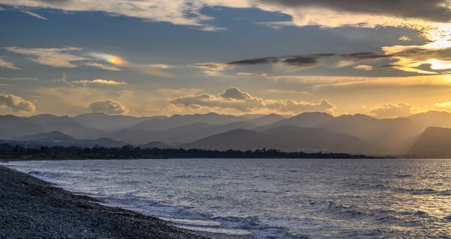 evening sun over mountains and Mediterranean sea 33