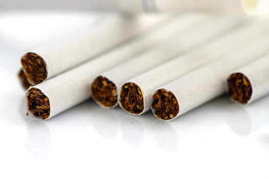 laid out cigarettes on a white background 1