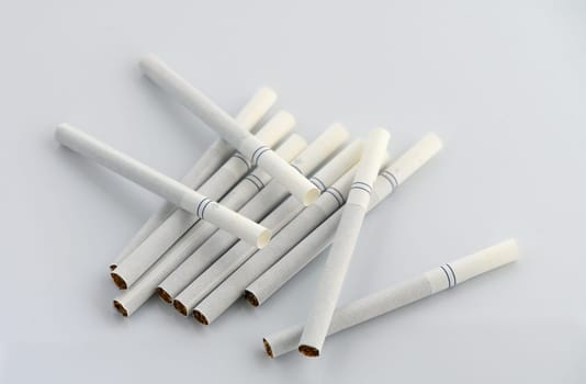laid out cigarettes on a white background