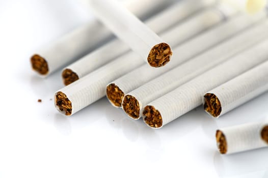 laid out cigarettes on a white background 2