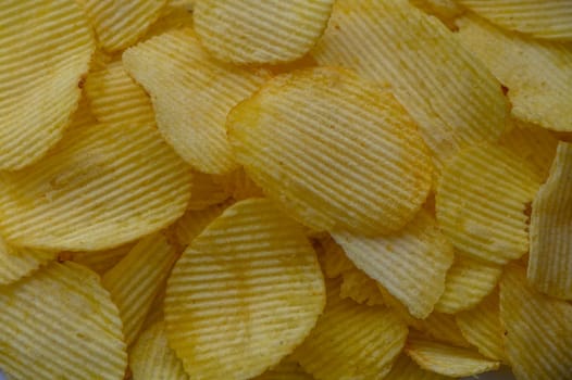 food background, delicious potato chips laid out on the table 5