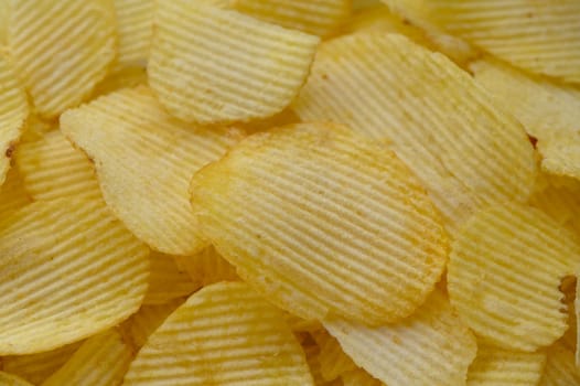 food background, delicious potato chips laid out on the table 4