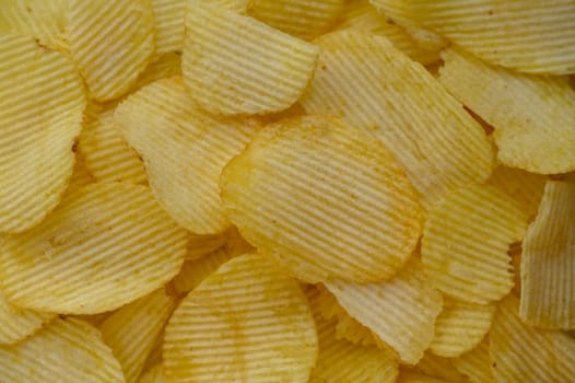 food background, delicious potato chips laid out on the table 6