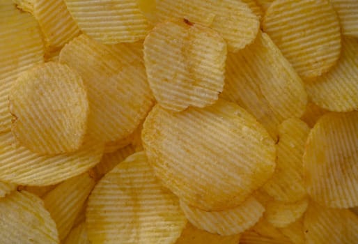 food background, delicious potato chips laid out on the table 8