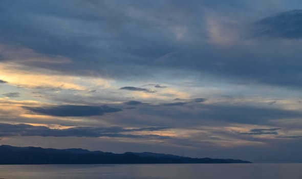 blue sunset sky with clouds over the Mediterranean sea in winter 7