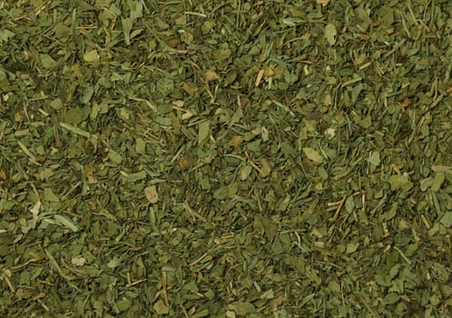 Background of dried herbs spice, celery, parsley, dill, Provence or Italian herbs, natural condiment pattern texture, elevated top view, directly above