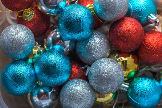multi-colored Christmas tree decorations as a background 9