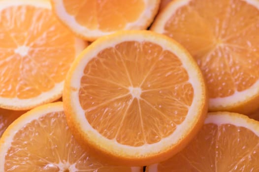 oranges cut into slices and laid out on the table as a food background 5