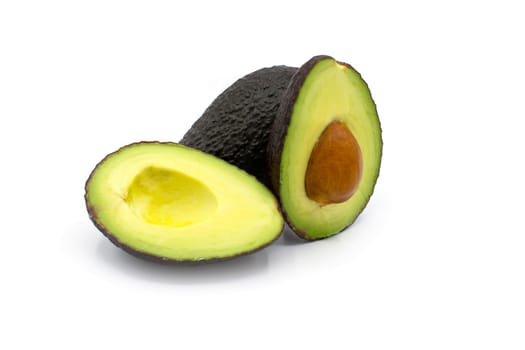 Fresh and healthy Avocado cut in half isolated