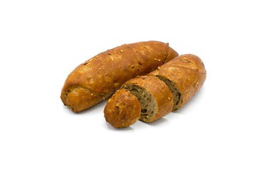 Fresh baked roll croissant cut in pieces isolated