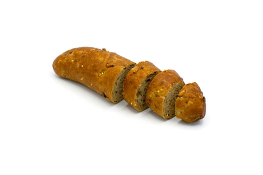 Fresh baked roll croissant cut in pieces isolated