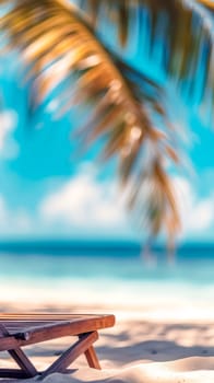single wooden sun lounger on a sandy beach with a softly focused palm tree overhead against a turquoise sea and blue sky, invoking a sense of a peaceful holiday retreat. vertical, copy space