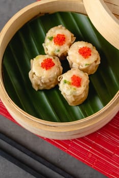 Shumai with shrimp and mushrooms, a traditional Chinese dumpling often served with dim sum