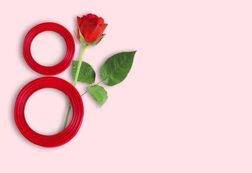 Number 8 from the ribbon greeting card design with beautiful red rose on pink background, flat lay and space for text. International Women's day.