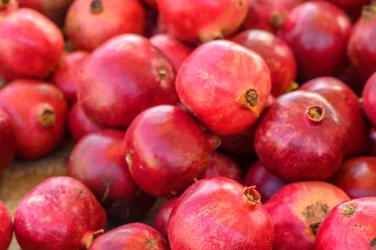 fresh juicy pomegranates at the bazaar on the island of Cyprus in autumn 2