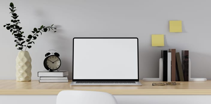Home office desk workspace. White blank screen monitor on modern working desk. Equipment on table. Modern office concept..