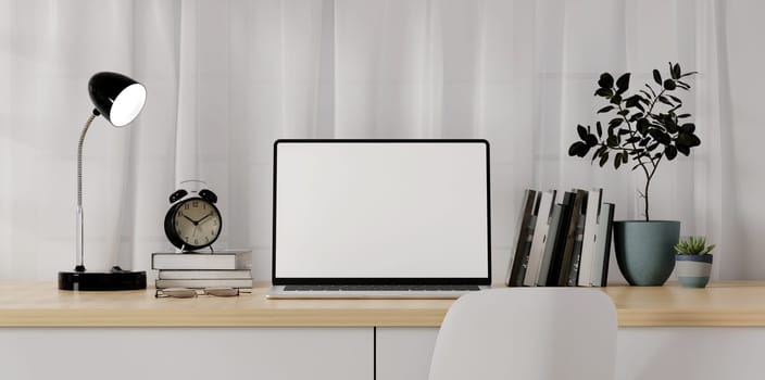 Home office desk workspace. White blank screen monitor on modern working desk. Equipment on table. Modern office concept..