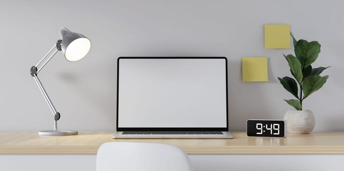 Home office desk workspace. White blank screen monitor on modern working desk. Equipment on table. Modern office concept..