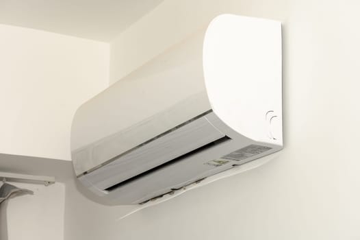 indoor air conditioner unit on a white wall