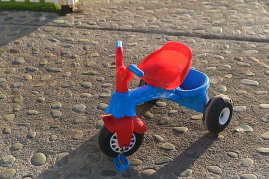 children's car on the playground near the sea