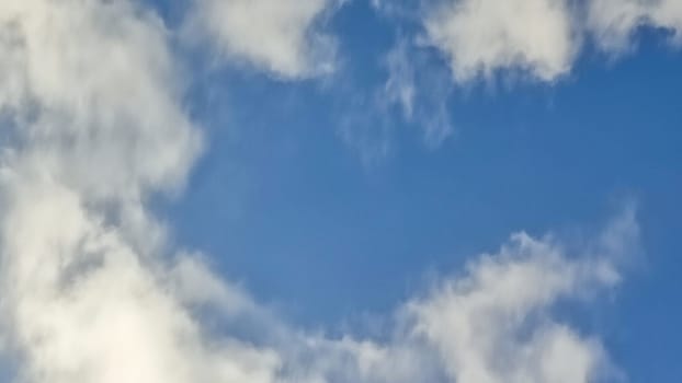 Blue light sky nature white clouds whether background . High quality photo