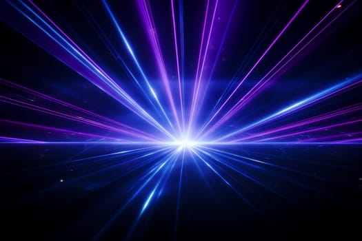 Blue and violet beams of bright laser light shining on black background. High quality photo