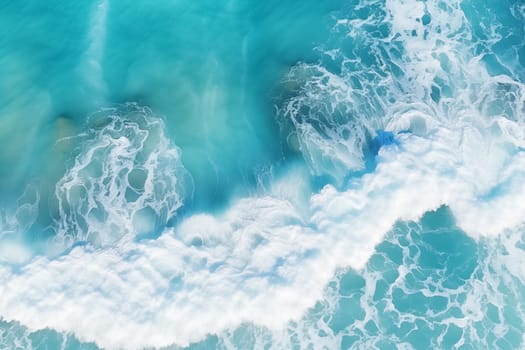 From above aerial view of turquoise ocean water with splashes and foam for abstract natural background and texture. High quality photo