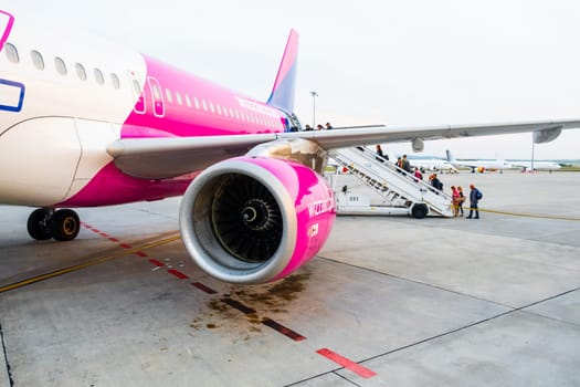 Close up turbine of WIzzair aircraft in airport, January 2024, Prague, Czech Republic