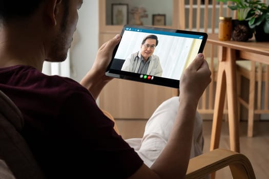 Doctor video call online by modish telemedicine software application for virtual meeting with patient