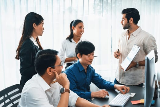 Group of diverse office worker employee working together on strategic business marketing planning in corporate office room. Positive teamwork in business workplace concept. Prudent