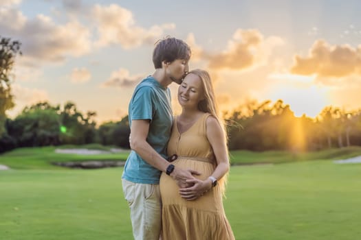 A blissful moment as a pregnant woman and her husband spend quality time together outdoors, savoring each other's company and enjoying the serenity of nature.
