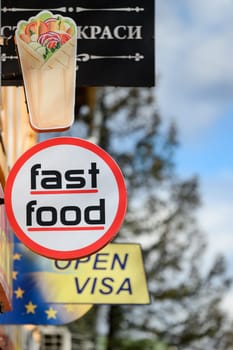 Ivano-Frankivsk, Ukraine March 26, 2023: Sign logo of a fast food restaurant on the street, an establishment where shawarma is prepared.