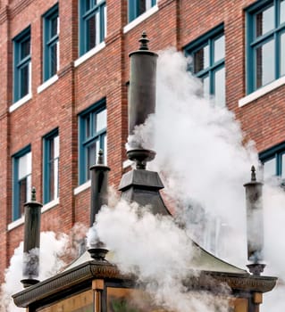 Steam street clock doing the noon chime in Vancouver, Canada.