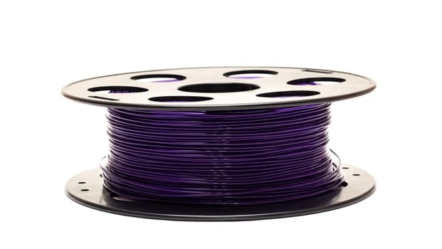 Coil with purple wires close up, isolated on a white background