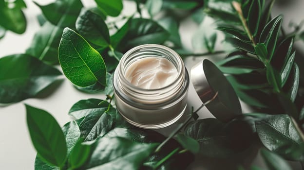 Cosmetics cream on a background of leaves. Selective focus. Nature.