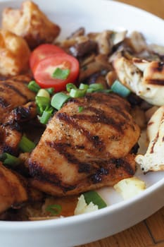 grill chicken meat served with salad on a plate ,