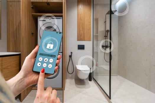 smart house, home automation, device with app icons. woman uses his smartphone with smarthome security app to unlock the door of his house